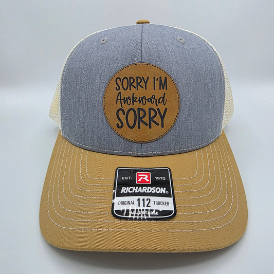 “Sorry I’m Awkward, Sorry” Leather Patch Hat – Richardson 112 Trucker Cap